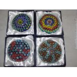 Four boxed millefiori paperweights