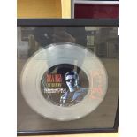 A framed and glazed Guns 'n' Roses clear vinyl single 'Terminator'