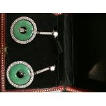 A boxed pair of jade and diamond earrings,
