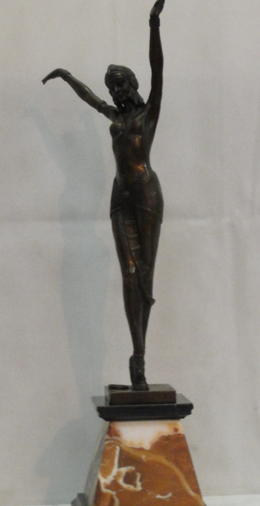 A bronze Art Deco lady on onyx base