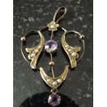 An Edwardian 9ct amethyst and pearl pendant
