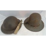 A WWII brodie helmet and fire watcher's type