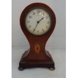 An Edwardian mahogany 8-day balloon-shaped mantel clock: movement signed 'Baynard'