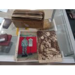 A box of WWII German stereoscopic cards and military postcards