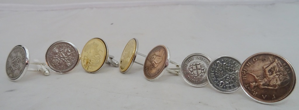 Four pairs of coin cufflinks