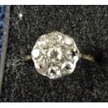An 18ct Victorian diamond daisy ring