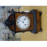 A 19th century wooden French mantel clock