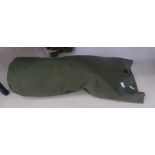 A duffel bag of military clothing and items