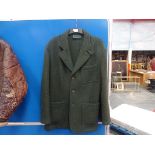 A Holland & Holland shooting jacket (100% wool)