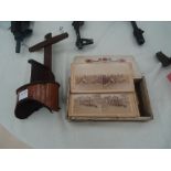 A stereoscopic viewer and cards depicting the Boer War