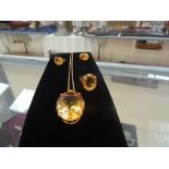 An 18ct gold pendant set with large citrine;