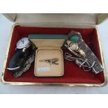 A box of jewellery to include ladies gold watch, brooches etc.