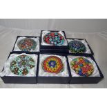 Six assorted glass paperweights