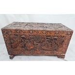 A camphor wood chest carved with dragons