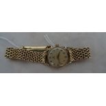 A 9ct ladies Omega wristwatch on 9ct adjustable strap