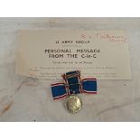 A 1937 Coronation medal with bow ribbon mount & Montgomery letter