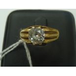 A gentleman's diamond and gold dress ring