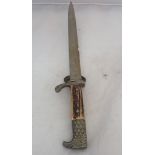 A WWII German Police clamshell dress dagger, missing spange to the grip,