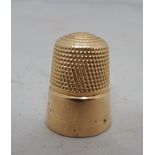 A 9ct gold thimble