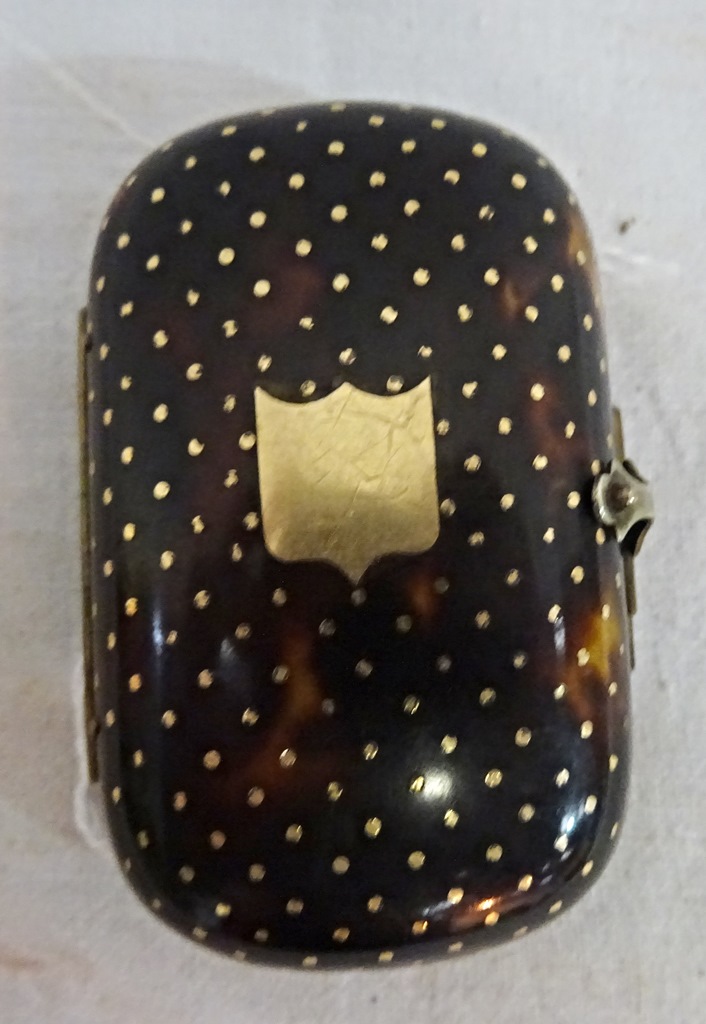A tortoiseshell and gold set miniature purse