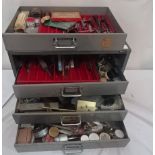 A cabinet of watchmakers tools etc