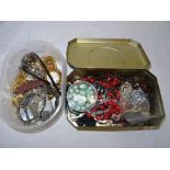 A quantity of vintage dress jewellery and watches