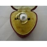 A 14k cornucopia pearl ring