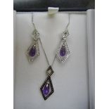 A cased amethyst & diamond necklace & earrings articulated briolette: set amethyst to each piece