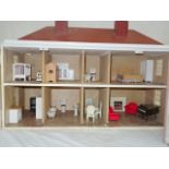 A 1970's doll's house & furniture
