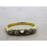 A 9ct gold and diamond ring (one diamond missing)