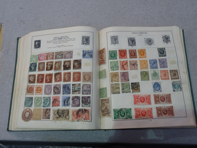 A vintage stamp album of World & GB to include Twopenny Blue,