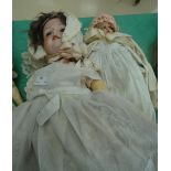 Two Armand Marseille composition dolls both in original clothing,