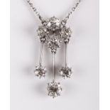 A diamond Deco-style drop pendant necklace,