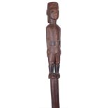 A 19th Century North African Staff: The top carved with an African Soldier dressed in military