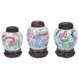 Three Chinese Famille Rose Ginger Jars: To include: an 18th-century jar finely decorated with