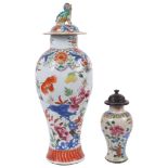 Two Chinese Famille Rose Vases: 19th century To include: a small baluster-shaped vase decorated