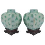 Two Chinese Green Glazed Jars with Lid: 18th/19th century The square-shaped bulbous and compressed