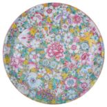 A Large 19th Century Chinese Famille Rose Mille Fleur Plate: Vividly enamelled with a variety of