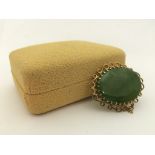 A 9ct gold nephrite jade brooch