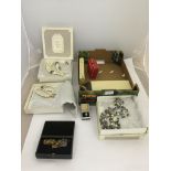 A quantity of cased vintage dress jewellery;