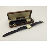 Two gentlemens' vintage gold wristwatches