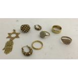 A quantity of 9ct and 14ct items: pendants,