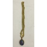 A black opal pendant and 9ct chain