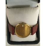 9ct gold Beucho-Girod gents wristwatch on leather strap