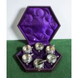 A cased set of silver plated salts