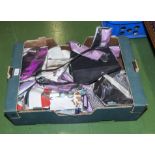 A box containing vintage nylon stockings and others