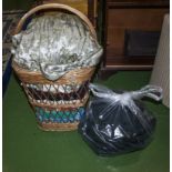 A basket containing vintage clothes