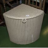 A Lloyd Loom linen basket