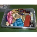 A box containing vintage clothing and others