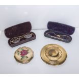 Two compacts and two pairs of vintage spectacles